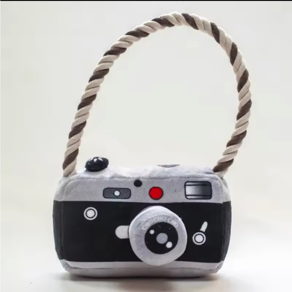 Dog toy camera with rope handle